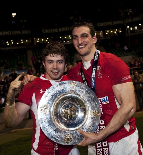 Wales' Sam Warburton (R) and Leigh Halfpenny, pictured with the Triple Crown trophy, in London, on February 25, 2012 Wales' Sam Warburton (R) and Leigh Halfpenny, pictured with the Triple Crown trophy, in London, on February 25, 2012