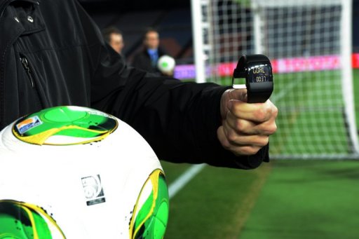 A FIFA official displays new goal-line technology for the press in Yokohama on December 5, 2012 A FIFA official displays new goal-line technology for the press in Yokohama on December 5, 2012