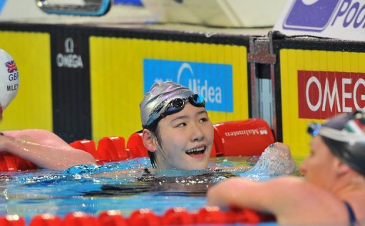 Ye Shiwen (C) of China celebrates her gold medal in the womens 200m individual medley final on December 15, 2012 Ye Shiwen (C) of China celebrates her gold medal in the womens 200m individual medley final on December 15, 2012