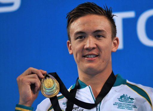 Robert Hurley of Australia smiles on the podium after winning the men's 50m backstroke final Robert Hurley of Australia smiles on the podium after winning the men's 50m backstroke final
