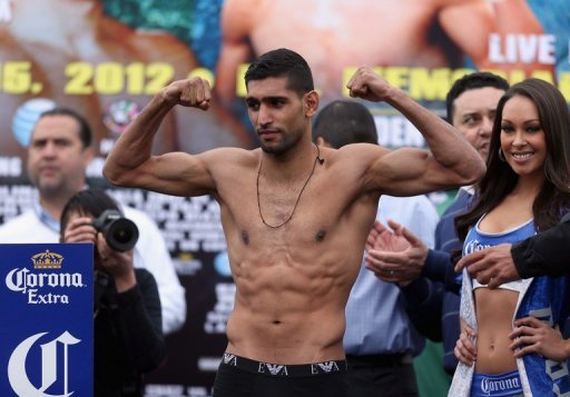 Amir Khan, seen here on the eve of his WBC light-welterweight title fight against Carlos Molina, on December 14, 2012 Amir Khan, seen here on the eve of his WBC light-welterweight title fight against Carlos Molina, on December 14, 2012