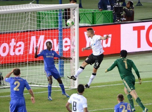 Corinthians forward Paolo Guerrero heads in against Chelsea in the Club World Cup final on December 16, 2012 in Japan Corinthians forward Paolo Guerrero heads in against Chelsea in the Club World Cup final on December 16, 2012 in Japan