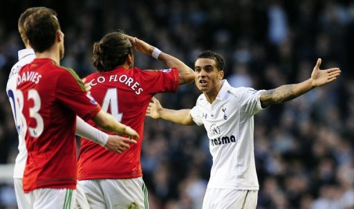 Tottenham defender Kyle Naughton (R) argues with Swansea defender Chico Flores at White Hart Lane on December 16, 2012 Tottenham defender Kyle Naughton (R) argues with Swansea defender Chico Flores at White Hart Lane on December 16, 2012