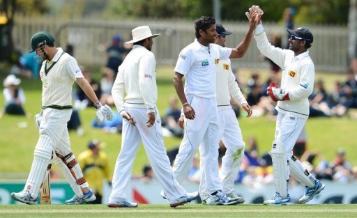 Chanaka Welegedara (3rd R) celebrates after dismissing Ed Cowan (L) at the first Hobart Test on December 17, 2012 Chanaka Welegedara (3rd R) celebrates after dismissing Ed Cowan (L) at the first Hobart Test on December 17, 2012