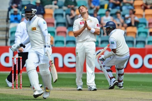 Australian bowler Shane Watson (C) looks to the heavens on the final day of the first Test in Hobart on December 18, 2012 Australian bowler Shane Watson (C) looks to the heavens on the final day of the first Test in Hobart on December 18, 2012
