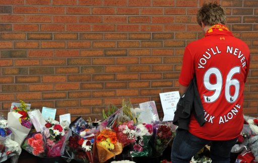 A supporter pays his respects outside Anfield to the 96 supporters who died in the 1989 Hillsborough disaster A supporter pays his respects outside Anfield to the 96 supporters who died in the 1989 Hillsborough disaster