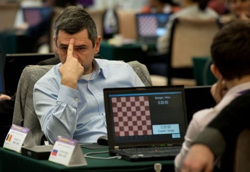 A chess player prepares to compete in a 'blinfold' chess tournament in Beijing on December 19, 2012 A chess player prepares to compete in a 'blinfold' chess tournament in Beijing on December 19, 2012