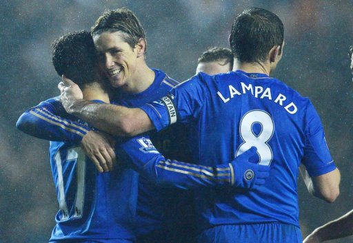 Fernando Torres (2nd left) hugs Eden Hazard as Chelsea score their 5th against Leeds at Elland Road on December 19, 2012 Fernando Torres (2nd left) hugs Eden Hazard as Chelsea score their 5th against Leeds at Elland Road on December 19, 2012