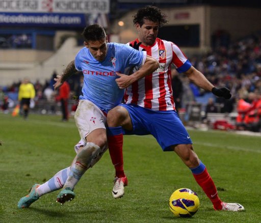 Atletico Madrid's forward Diego da Silva Costa (R) vies with Celta's defender Hugo Mallo (L) on December 21, 2012 Atletico Madrid's forward Diego da Silva Costa (R) vies with Celta's defender Hugo Mallo (L) on December 21, 2012
