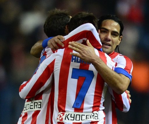 Atletico Madrid players celebrate their 1-0 victory over Celta de Vigo, in Madrid, on December 21, 2012 Atletico Madrid players celebrate their 1-0 victory over Celta de Vigo, in Madrid, on December 21, 2012