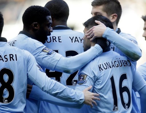 Manchester City's players celebrate scoring a goal against Newcastle, at St James Park, on December 15, 2012 Manchester City's players celebrate scoring a goal against Newcastle, at St James Park, on December 15, 2012