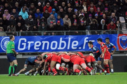 Grenoble and Toulouse' players on December 22, 2012 at the Stade des Alpes stadium in Grenoble,France Grenoble and Toulouse' players on December 22, 2012 at the Stade des Alpes stadium in Grenoble,France
