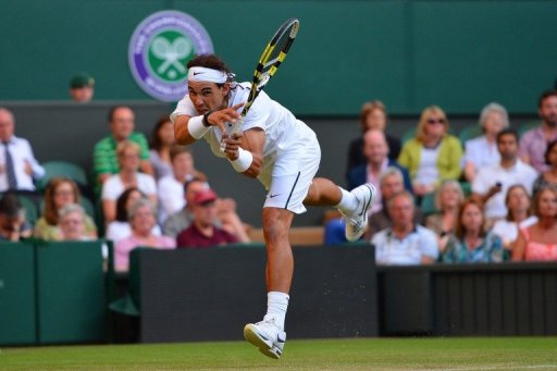 Spain's Rafael Nadal plays a shot against Czech Republic's Lukas Rosol at Wimbledon on June 28, 2012 Spain's Rafael Nadal plays a shot against Czech Republic's Lukas Rosol at Wimbledon on June 28, 2012