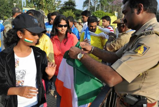 Cricket fans undergo security checks in Bangalore on December 25, 2012 Cricket fans undergo security checks in Bangalore on December 25, 2012