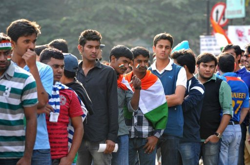 Indian cricket fans wait in line outside The M. Chinnaswamy Stadium in Bangalore on December 25, 2012 Indian cricket fans wait in line outside The M. Chinnaswamy Stadium in Bangalore on December 25, 2012