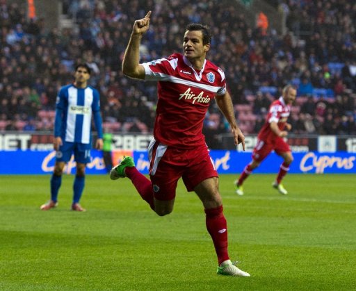 Queens Park Rangers' defender Ryan Nelsen celebrates after scoring a goal in Wigan on December 8, 2012 Queens Park Rangers' defender Ryan Nelsen celebrates after scoring a goal in Wigan on December 8, 2012