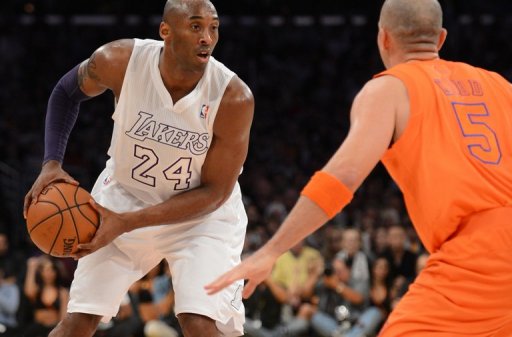 Kobe Bryant of the Los Angeles Lakers (L) is guarded by Jason Kidd of the New York Knicks on December 25, 2012 Kobe Bryant of the Los Angeles Lakers (L) is guarded by Jason Kidd of the New York Knicks on December 25, 2012