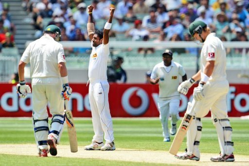 Dhammika Prasad celebrates dismissing Shane Watson (R) on the second day of the second Test on December 27, 2012 Dhammika Prasad celebrates dismissing Shane Watson (R) on the second day of the second Test on December 27, 2012