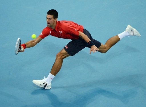 Novak Djokovic reaches for a forehand at the China Open in Beijing on October 2, 2012 Novak Djokovic reaches for a forehand at the China Open in Beijing on October 2, 2012
