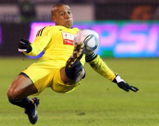 Anzhi Makhachkala's Brazilian defender Roberto Carlos clears the ball during a game in St. Petersburg on March 21, 2011 Anzhi Makhachkala's Brazilian defender Roberto Carlos clears the ball during a game in St. Petersburg on March 21, 2011
