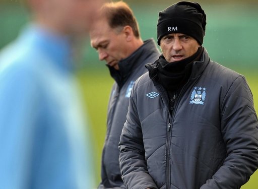 Manchester City manager Roberto Mancini (R) with his assistant David Platt in Manchester on December 3, 2012 Manchester City manager Roberto Mancini (R) with his assistant David Platt in Manchester on December 3, 2012