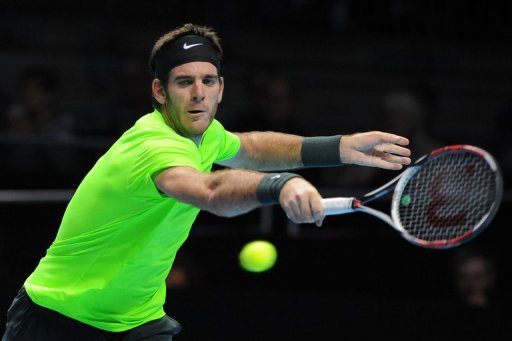 Juan Martin Del Potro reaches for a return at the ATP World Tour Finals tennis tournament in London on November 11, 2012 Juan Martin Del Potro reaches for a return at the ATP World Tour Finals tennis tournament in London on November 11, 2012