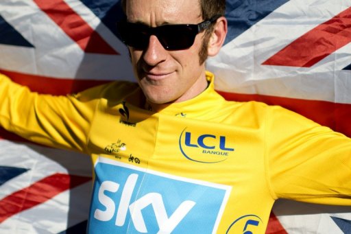 Bradley Wiggins celebrates during the 2012 Tour de France on the famous Paris-Champs-Elysees Avenue, on July 22, 2012 Bradley Wiggins celebrates during the 2012 Tour de France on the famous Paris-Champs-Elysees Avenue, on July 22, 2012