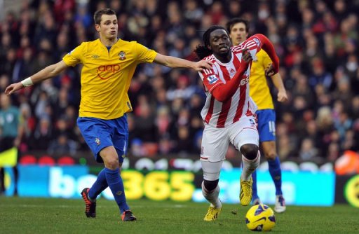 Southampton's French midfielder Morgan Schneiderlin (L) vies with Stoke City's Trinidadian striker Kenwyne Jones (R) Southampton's French midfielder Morgan Schneiderlin (L) vies with Stoke City's Trinidadian striker Kenwyne Jones (R)