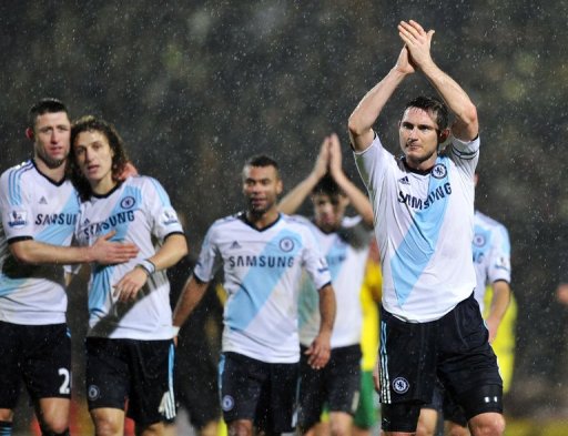 Chelsea's Frank Lampard (R) applauds the fans after his team won their match against Norwich, on December 26, 2012 Chelsea's Frank Lampard (R) applauds the fans after his team won their match against Norwich, on December 26, 2012