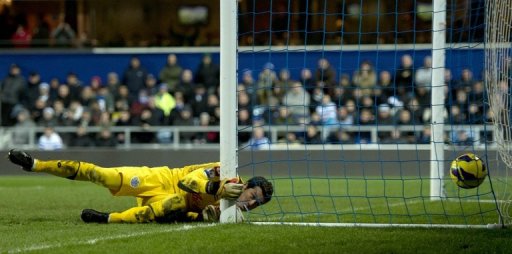 QPR goalkeeper Julio Cesar watches as the ball hits the back of the net for Liverpool's third goal on December 30, 2012 QPR goalkeeper Julio Cesar watches as the ball hits the back of the net for Liverpool's third goal on December 30, 2012