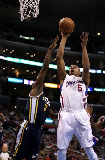 Caron Butler (R) of the Los Angeles Clippers shoots over DeMarre Carroll of the Utah Jazz, on December 30, 2012 Caron Butler (R) of the Los Angeles Clippers shoots over DeMarre Carroll of the Utah Jazz, on December 30, 2012