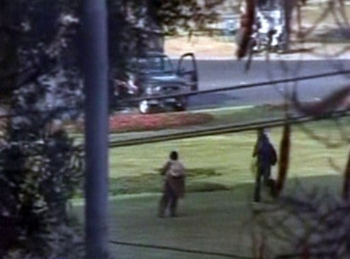 An AAJ TV image shows gunmen during an attack on a bus carrying the Sri Lankan cricket team in Lahore on March 3, 2009 An AAJ TV image shows gunmen during an attack on a bus carrying the Sri Lankan cricket team in Lahore on March 3, 2009