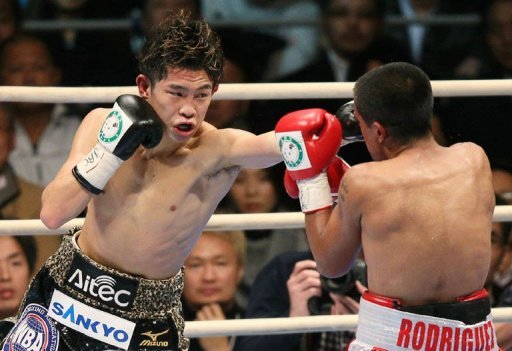 Japan's Kazuto Ioka (L) fights Jose Rodriguez of Mexico in Osaka on December 31, 2012 Japan's Kazuto Ioka (L) fights Jose Rodriguez of Mexico in Osaka on December 31, 2012