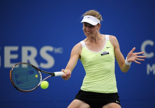 Mona Barthel returns to Agnieska Radwanska of Poland during a Rogers Cup match in Montreal on August 9, 2012 Mona Barthel returns to Agnieska Radwanska of Poland during a Rogers Cup match in Montreal on August 9, 2012