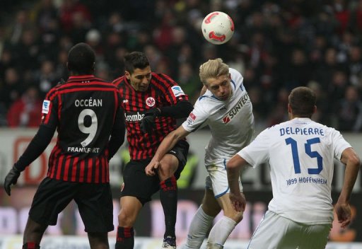 L-R: Frankfurt's Olivier Occean and Karim Matmour vie with Hoffenheim's Andreas Beck and Matthieu Delpierre L-R: Frankfurt's Olivier Occean and Karim Matmour vie with Hoffenheim's Andreas Beck and Matthieu Delpierre