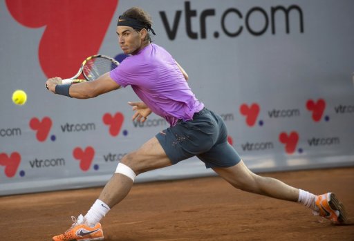 Rafael Nadal hits a return to Horacio Zeballos, in Vina del Mar, on February 10, 2013 Rafael Nadal hits a return to Horacio Zeballos, in Vina del Mar, on February 10, 2013