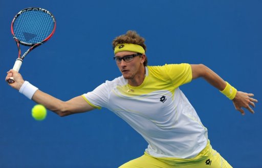 Denis Istomin of Uzbekistan plays a return at the Australian Open, on January 17, 2013 Denis Istomin of Uzbekistan plays a return at the Australian Open, on January 17, 2013