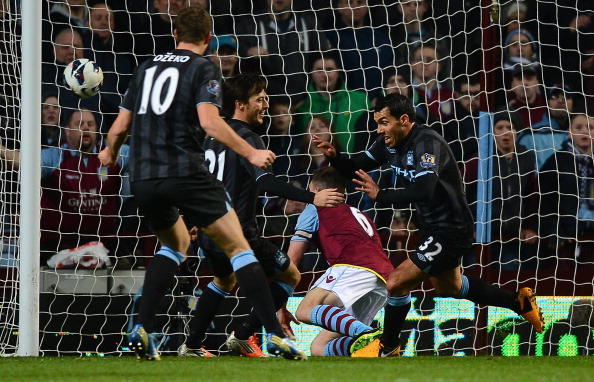 BIRMINGHAM, ENGLAND - MARCH 04: Carlos Tevez of Manchester City celebrates scoring the opening goal during the Barclays Premier League match between Aston Villa and Manchester City at Villa Park on March 4, 2013 in Birmingham, England.