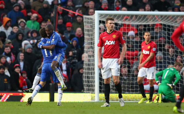 Ramires of Chelsea celebrates scoring his team's second goal with team-mate Oscar (l) during the FA Cup sponsored by Budweiser Sixth Round match between Manchester United and Chelsea at Old Trafford on March 10, 2013 in Manchester, England.
