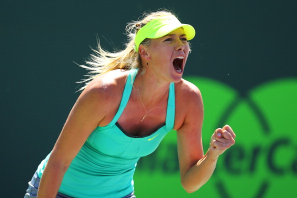 Maria Sharapova of Russia celebrates winning a point against Sara Errani of Itay during Day 10 of the Sony Open at the Crandon Park Tennis Center on March 27, 2013 in Key Biscayne, Florida. (Photo by Al Bello/Getty Images)
