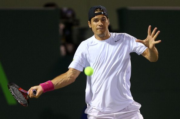 KEY BISCAYNE, FL - MARCH 27: Tommy Haas of Germany plays a match against Gilles Simon of France during Day 10 of the Sony Open at Crandon Park Tennis Center on March 27, 2013 in Key Biscayne, Florida. (Photo by Mike Ehrmann/Getty Images)