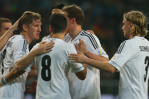 ASTANA, KAZAKHSTAN - MARCH 22: Bastian Schweinsteiger (2nd L) of Germany celebrates scoring the opening goal with his team mates during the FIFA 2014 World Cup qualifier group C match between Kazakhstan and Germany