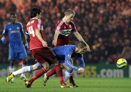Chelsea's Fernando Torres (C) gets squeezed out during a match against Middlesborough, on February 27, 2013 Chelsea's Fernando Torres (C) gets squeezed out during a match against Middlesborough, on February 27, 2013