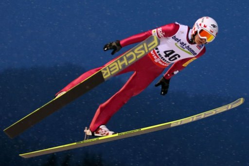 Kamil Stoch soars through the air in Predazzo, north Italy on February 23, 2013 Kamil Stoch soars through the air in Predazzo, north Italy on February 23, 2013