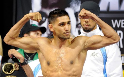 Amir Khan poses during a weigh-in at the Mandalay Bay Resort & Casino on July 13, 2012 in Las Vegas Amir Khan poses during a weigh-in at the Mandalay Bay Resort & Casino on July 13, 2012 in Las Vegas