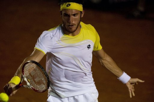 Leonardo Mayer of Argentina hits a return to Rafael Nadal of Spain in Acapulco, Guerrero state on February 28, 2013 Leonardo Mayer of Argentina hits a return to Rafael Nadal of Spain in Acapulco, Guerrero state on February 28, 2013