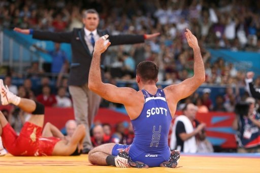 American Coleman Scott (R) celebrates winning the Men's 60kg Freestyle bronze medal during the London 2012 Olympic Games American Coleman Scott (R) celebrates winning the Men's 60kg Freestyle bronze medal during the London 2012 Olympic Games