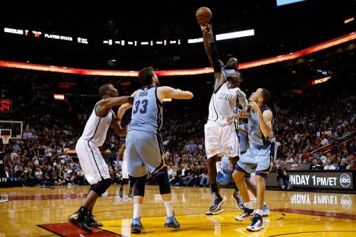 LeBron James of the Miami Heat competes for a rebound with Quincy Pondexter of the Memphis Grizzlies March 1, 2013 LeBron James of the Miami Heat competes for a rebound with Quincy Pondexter of the Memphis Grizzlies March 1, 2013