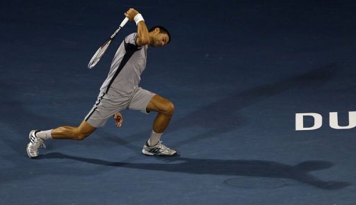 Serbia's Novak Djokovic returns the ball to Czech Republic's Tomas Berdych on March 2, 2013 Serbia's Novak Djokovic returns the ball to Czech Republic's Tomas Berdych on March 2, 2013