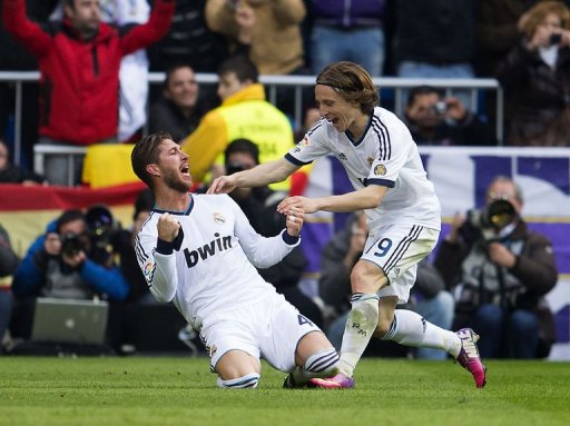 Real Madrid's defender Sergio Ramos (L) celebrates with midfielder Luka Modric after scoring in Madrid on March 2, 2013 Real Madrid's defender Sergio Ramos (L) celebrates with midfielder Luka Modric after scoring in Madrid on March 2, 2013